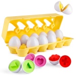 Lernspielzeug in Form von Eiern für Kinder mit gelbem Korb und bunten Formen
