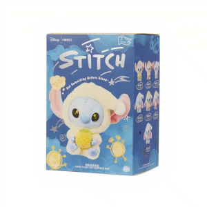 Boite en carton avec un stitch en pyjama dessus